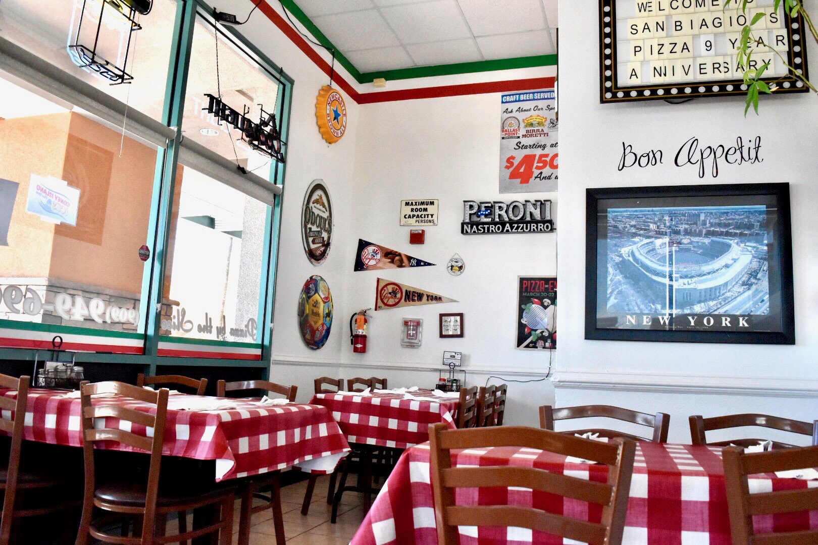 Photo of tables placed arounf the restraunt.